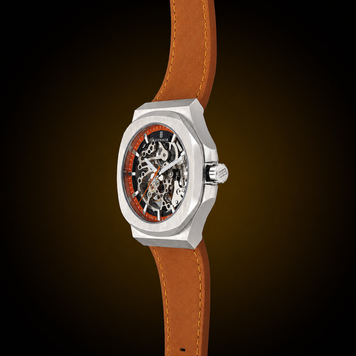 A skeleton watch with a silver-toned case, a brown leather strap, and a black dial with orange accents, shown against a dark brown gradient background.