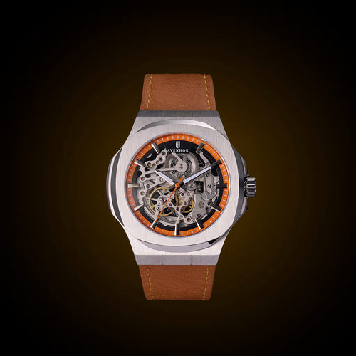 Watch with brown leather strap and transparent face on a dark background